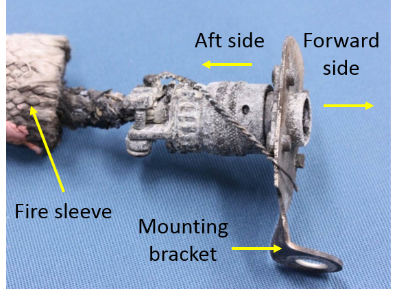 Figure 3: Bracket-mounted connector plug and fire sleeve